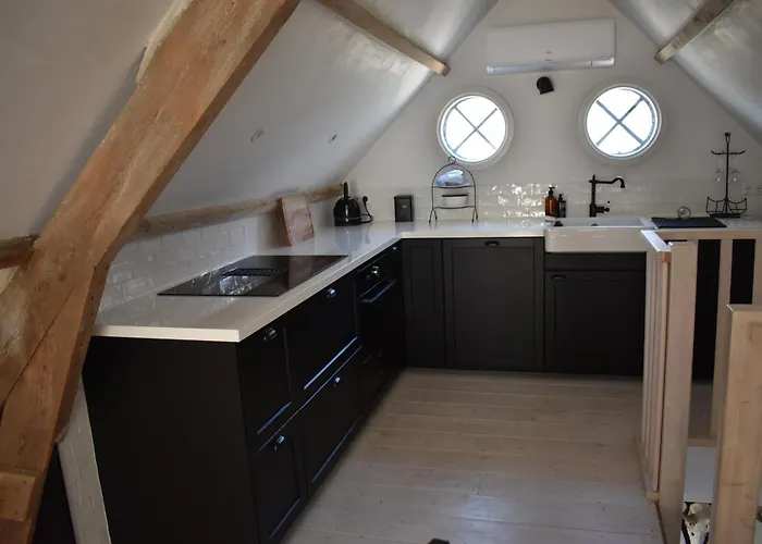 Het Koetshuis Apartamento *